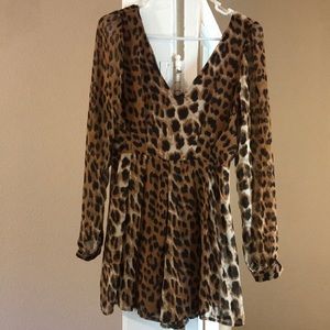 Cheetah romper. Worn twice.